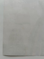 Plain gray sheet of paper on a white background