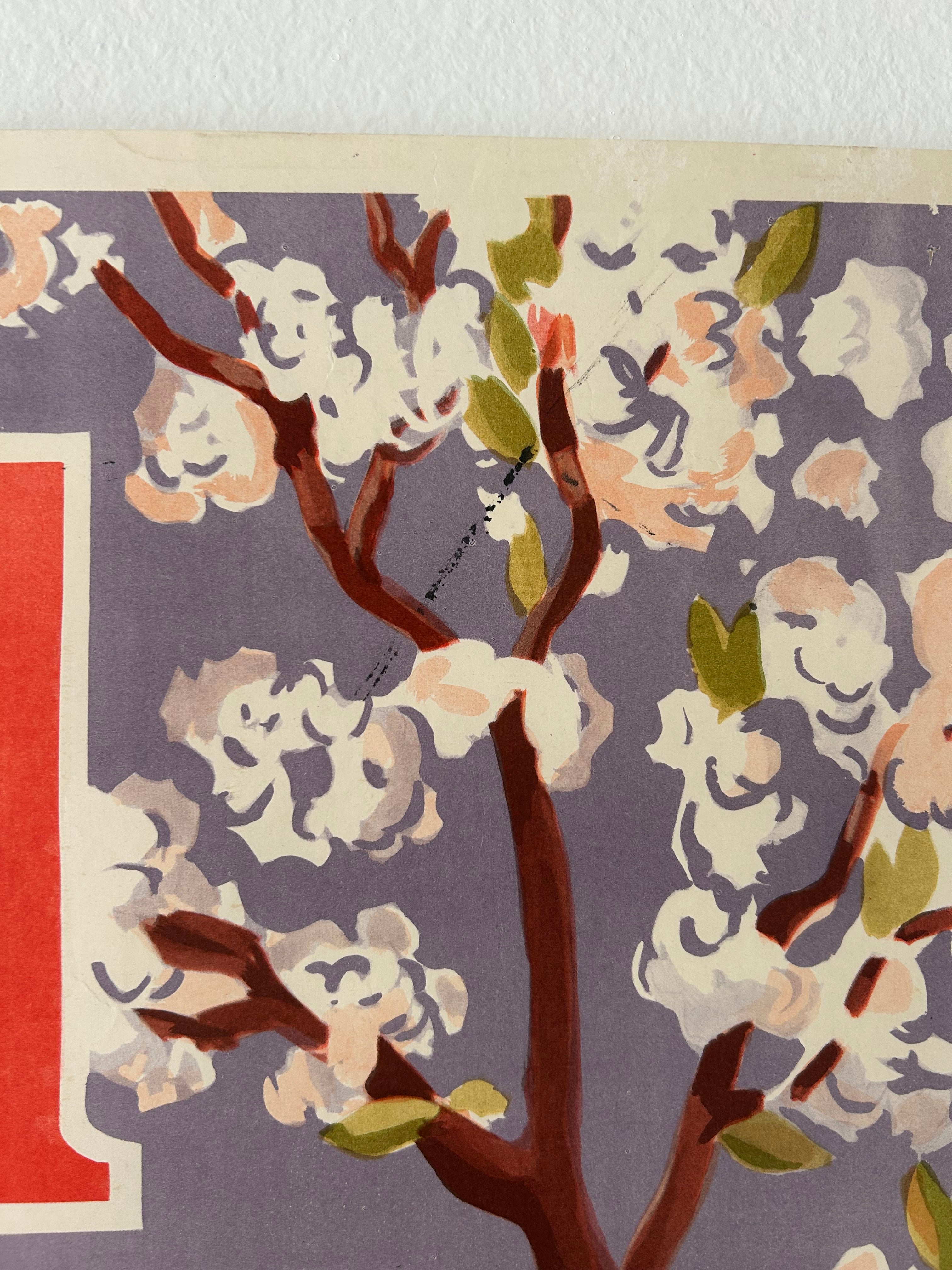 Decorative paper with floral branch design on a purple background