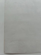 Gray textured paper on a white background