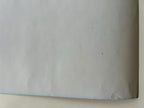 White paper with blue border on a white background