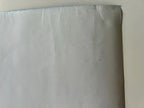 Sheet of white paper on a light gray background
