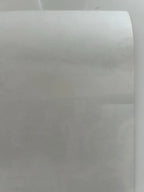 Sheet of white paper with a textured surface