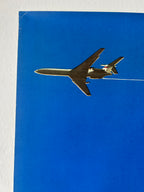 An airplane on a blue background