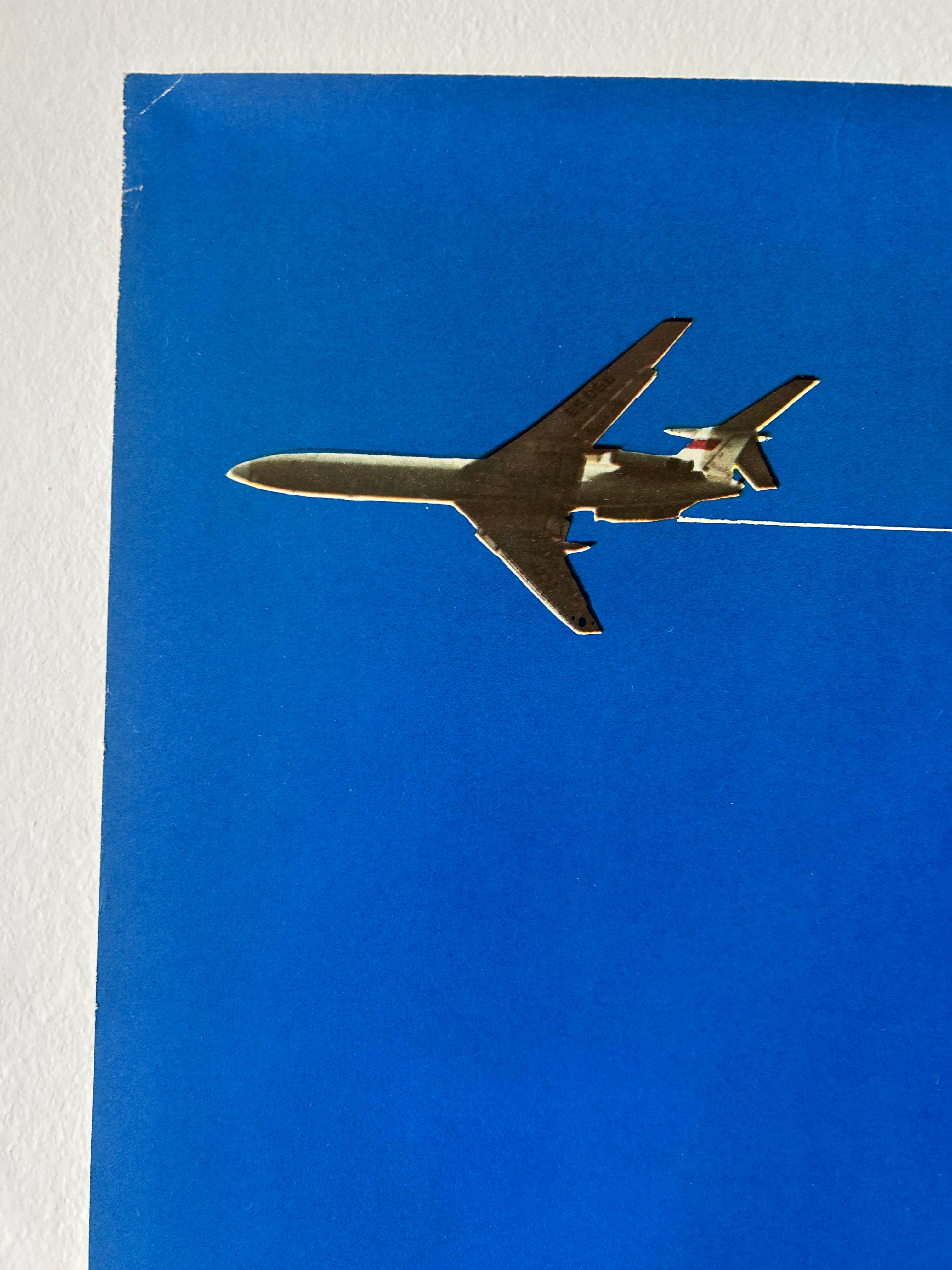 An airplane on a blue background
