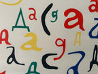 Colorful letters 'c, a',  and 'd' on a white background