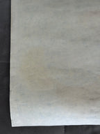 Sheet of white paper on a black background