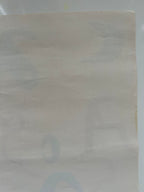 Close-up of a beige paper with subtle patterns 
