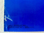  text and a white label on a textured surface