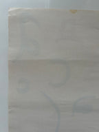 Close-up of a textured beige fabric with a white background