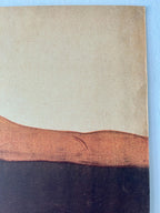 Three-tone color swatch with brown, black, and beige on a blue background