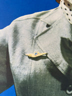 Soviet Airlines Pin on a gray jacket against a blue background
