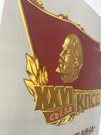 Decorative item with gold embossed design and text on a white background