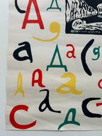 Colorful letter 'a' shapes on a white background