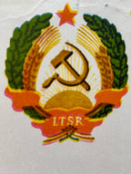 Lithuanian Coat of arms with hammer and sickle symbol and 'LTSR' text on a light background