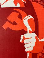 Red and white graphic of a hand holding a  micr0phone, a hammer against a red background