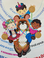 Illustration of a bear character with children in traditional outfits on an Olympic-themed background.