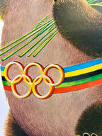 Close-up of Moscow Olympic bear with Olympic rings and stripes on its headgear