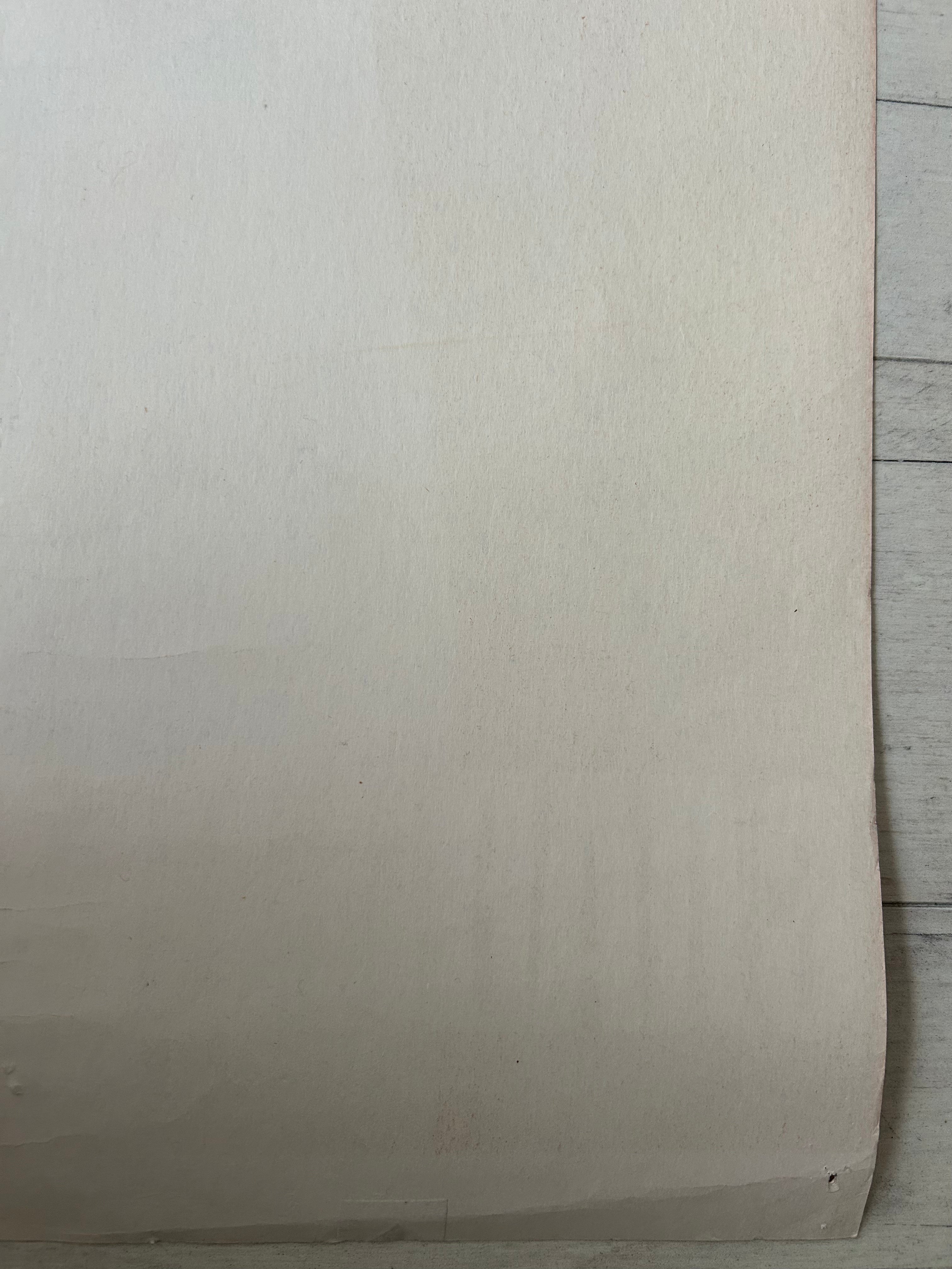 Beige paper on a wooden surface
