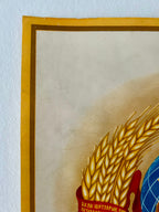 Vintage-style illustration of wheat with a decorative border on a textured surface.