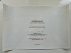 Framed document with text on a white background