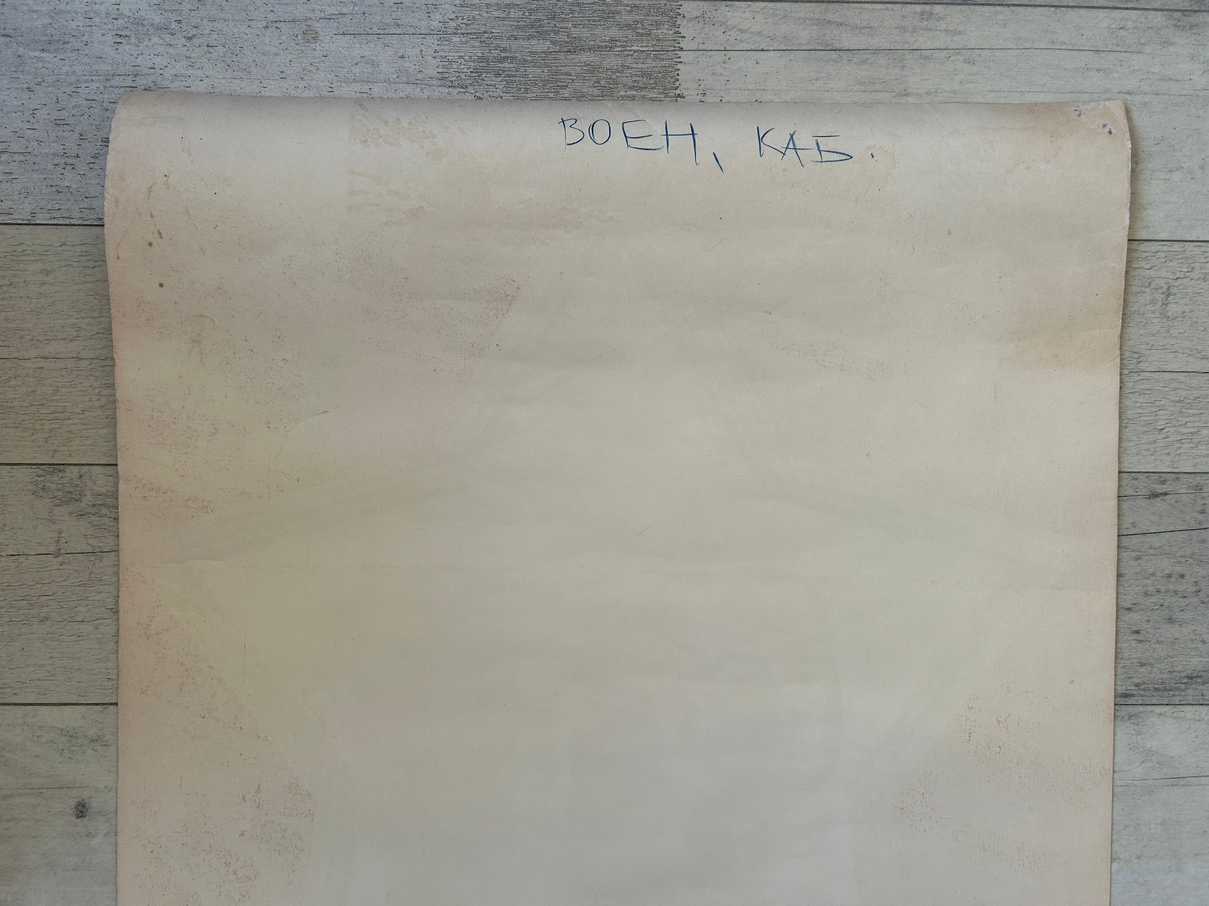 Large piece of brown paper with text on a wooden surface