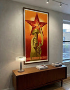 Framed poster with a star and hand holding a hammer and sickle