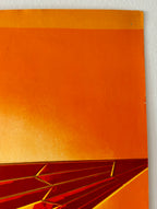 Abstract art piece with orange and red colors on a white background