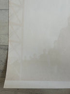 White sheet of paper on a wooden surface