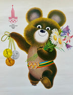 Illustration of Moscow Olympic bear holding flowers and medals with Olympic rings, on a light gray background.