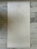 Beige paper on a wooden surface