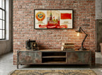 Vintage-style USSR propaganda entertainment console against a brick wall with a framed poster above.