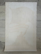 White textured paper with a printed design of a person holding a flag on a wooden surface