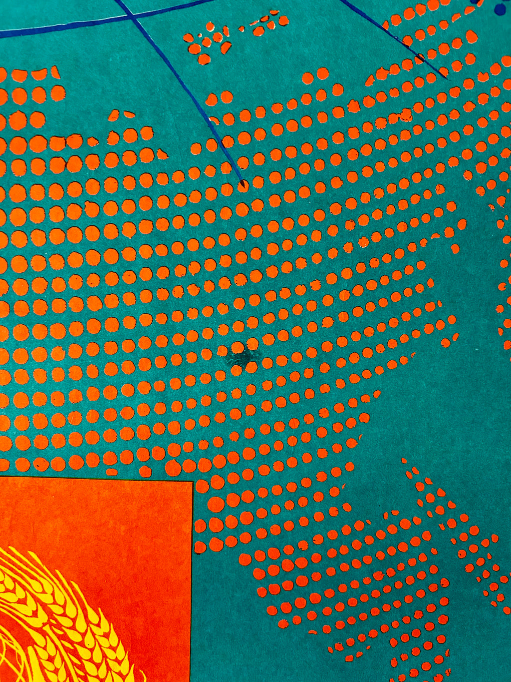 Patterned design with orange dots on a teal background