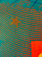 Patterned fabric with orange dots on a teal background
