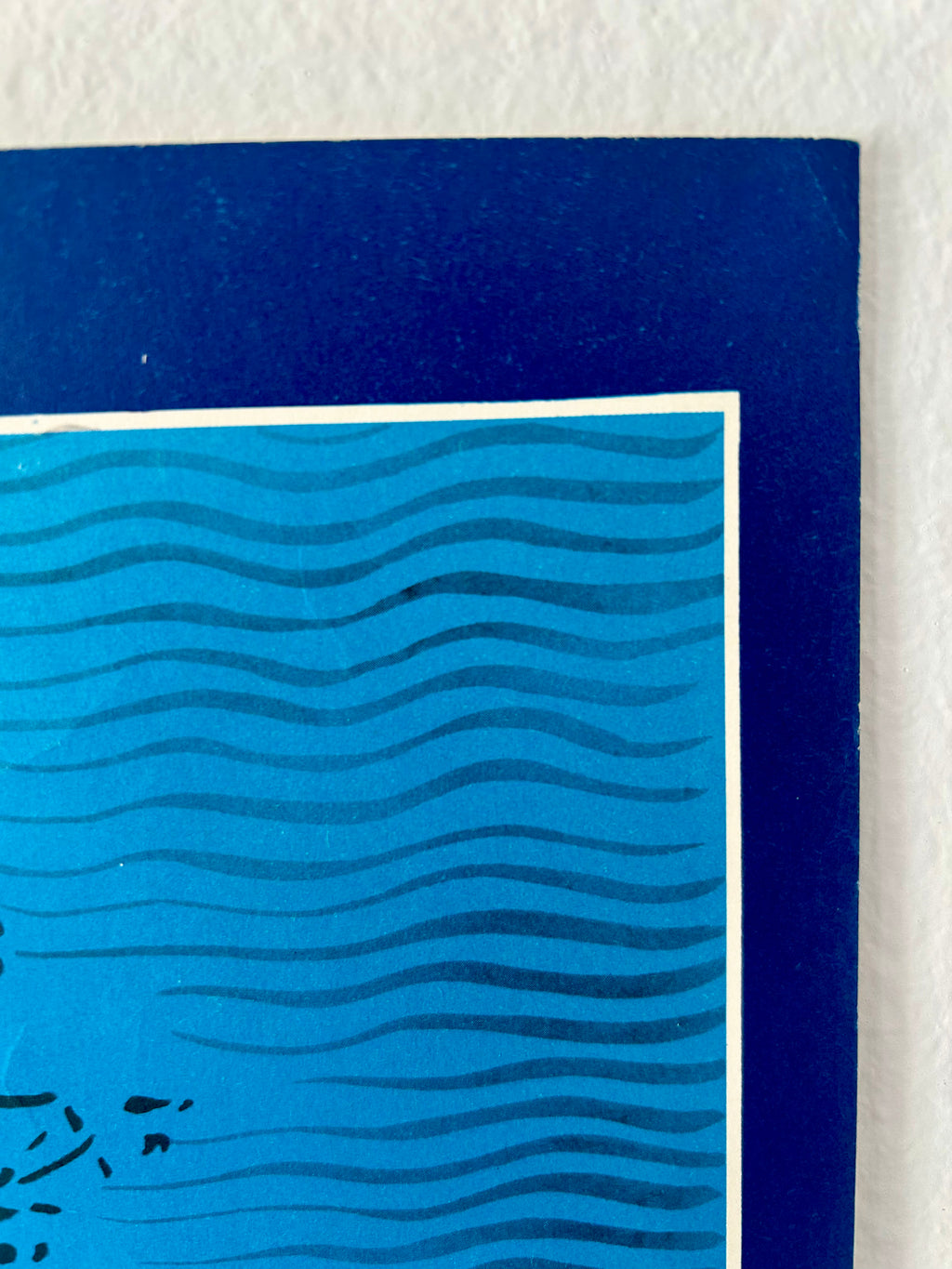 Blue wavy pattern on a white background