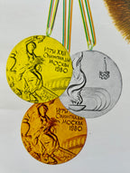 Three Moscow Olympics medals from the 1980 Moscow Olympics on a white background.