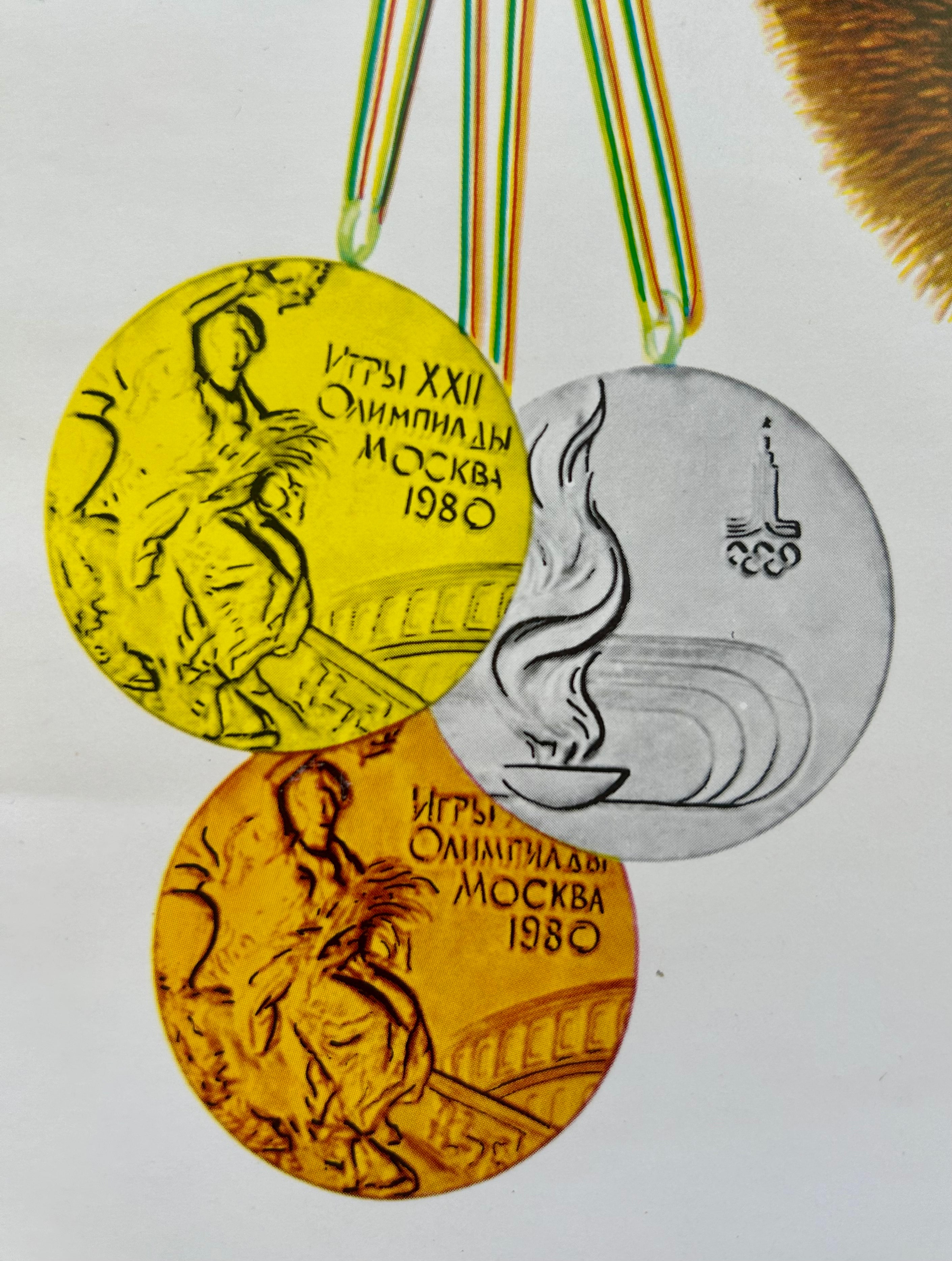 Three Moscow Olympics medals from the 1980 Moscow Olympics on a white background.
