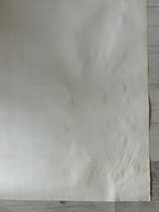 White fabric on a wooden surface