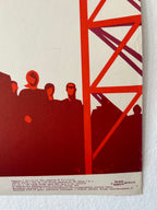Red and white graphic design with silhouettes and geometric shapes on a textured surface.