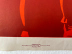 Red poster with black text on a white background