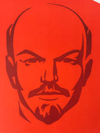 Stylized portrait of communist leader, Vladimir Lenin,  on a red background