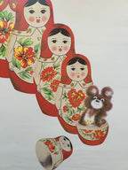 Set of Russian nesting dolls with a bear on a white background