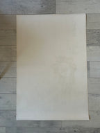Plain sheet of paper on a wooden surface