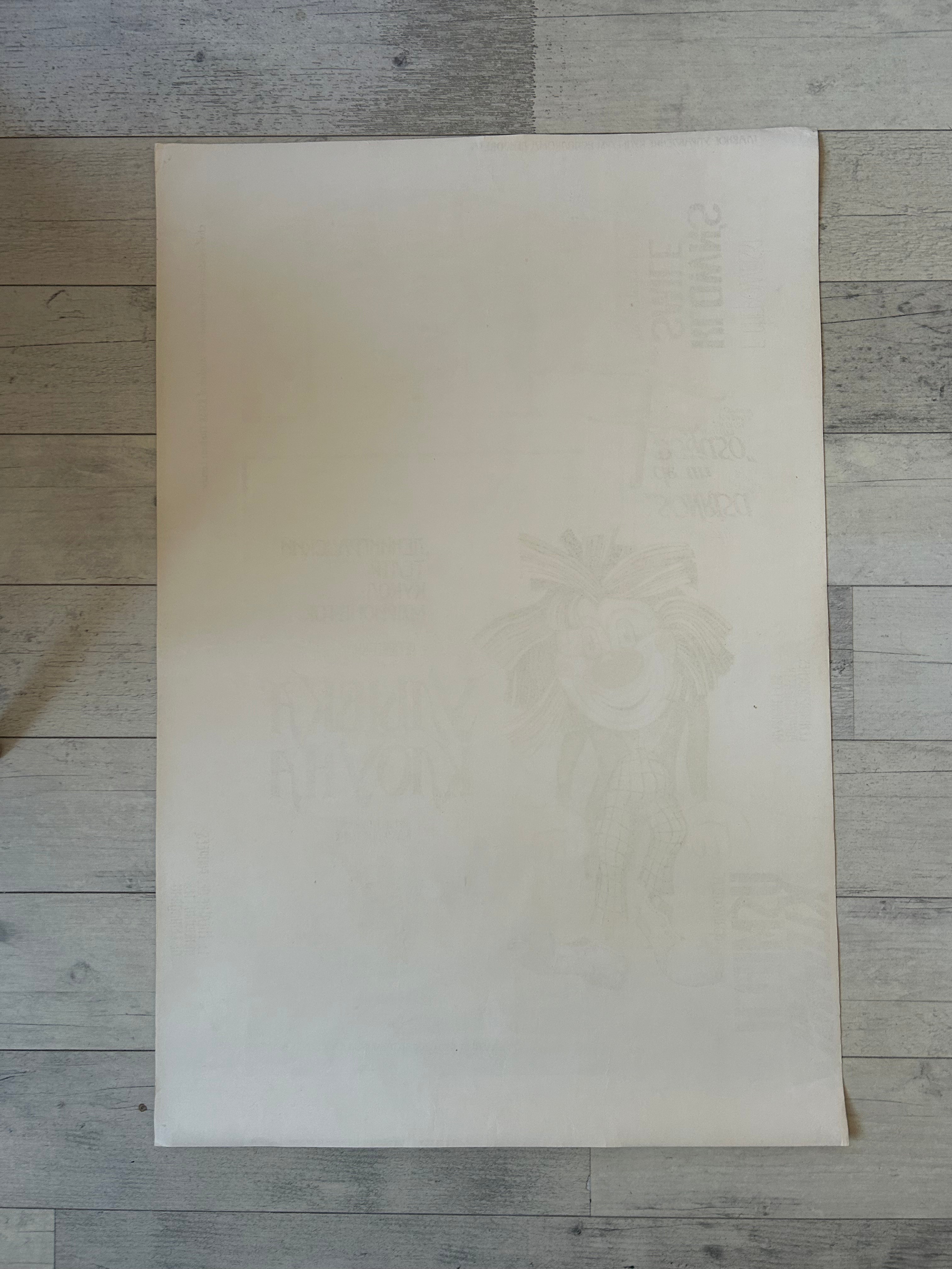 Plain sheet of paper on a wooden surface