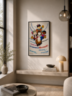 Framed artwork on a wall in a modern living room with decor elements.