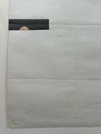 White marble surface with a black rectangular patch