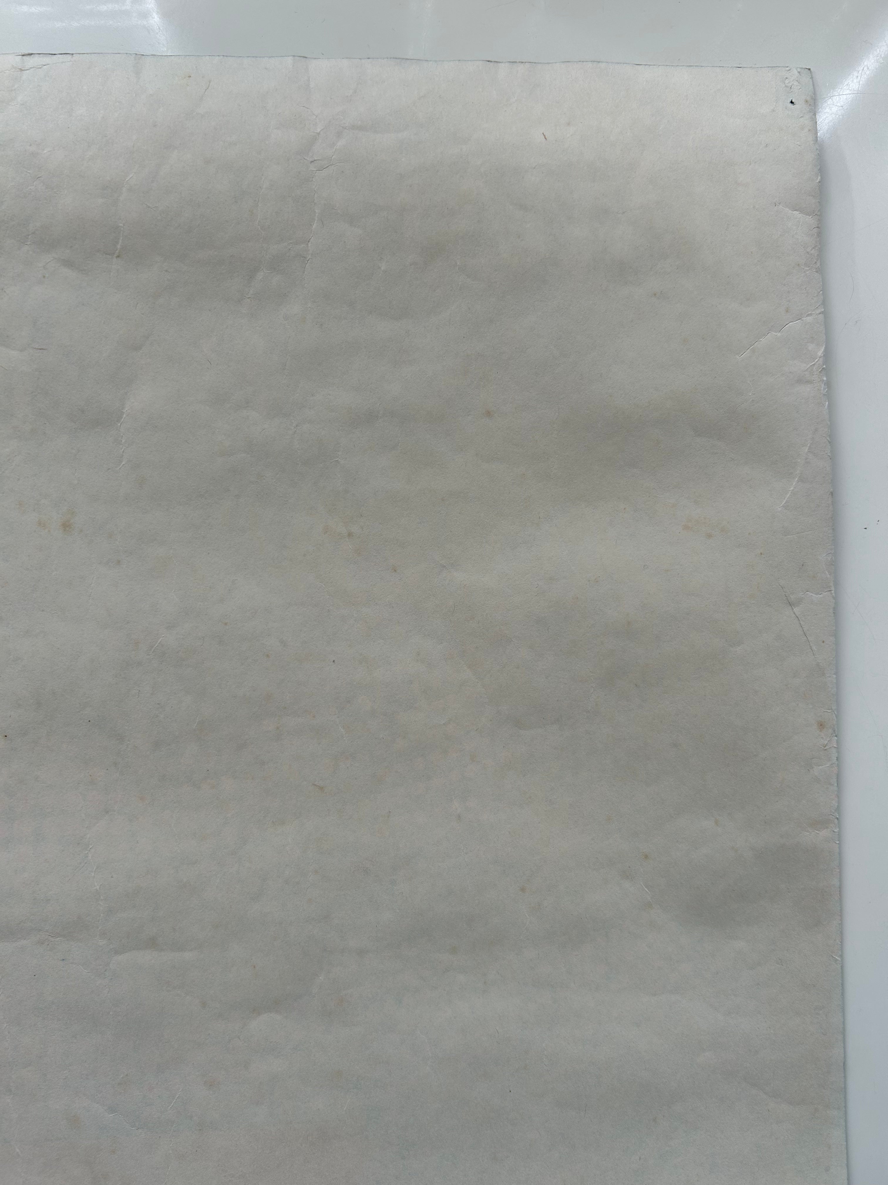 Close-up of a textured beige fabric sheet