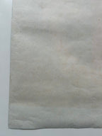 Rectangular piece of gray paper on a white background