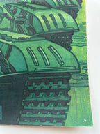 Close-up of green tank-like structures on a textured surface