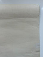 Roll of white paper on a light gray background